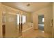 Bathroom featuring a separate tub and glass-enclosed shower with natural light at 343 Dune Ridge Ave, North Las Vegas, NV 89031