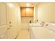 Laundry room with full-size washer and dryer at 343 Dune Ridge Ave, North Las Vegas, NV 89031