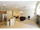 Open concept living room showcasing seamless flow to kitchen and dining areas at 343 Dune Ridge Ave, North Las Vegas, NV 89031