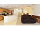 Inviting open-concept living area featuring a kitchen and dining table at 343 Dune Ridge Ave, North Las Vegas, NV 89031