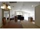 Inviting living room with plenty of natural light, comfortable seating and neutral carpet at 343 Dune Ridge Ave, North Las Vegas, NV 89031