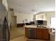 Open-concept living area with combined kitchen, dining, and living spaces, perfect for entertaining at 343 Dune Ridge Ave, North Las Vegas, NV 89031