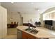 Open-concept living space connecting kitchen, dining, and living area, ideal for Gathering gatherings at 343 Dune Ridge Ave, North Las Vegas, NV 89031