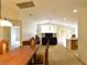 Spacious living room featuring neutral colors, an open layout, and large windows for ample natural light at 343 Dune Ridge Ave, North Las Vegas, NV 89031