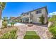 Expansive backyard featuring a pool, spa, patio, and landscaped areas for ultimate relaxation at 3552 Coventry Gardens Dr, Las Vegas, NV 89135