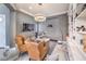 Comfortable home office with custom bookshelves, modern lighting, and a sleek wooden desk at 3552 Coventry Gardens Dr, Las Vegas, NV 89135
