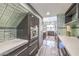 Modern kitchen with custom cabinetry, built-in stainless steel appliances, and sleek countertops at 3552 Coventry Gardens Dr, Las Vegas, NV 89135