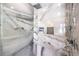 Modern tiled shower features shower niche and handheld sprayer at 3552 Coventry Gardens Dr, Las Vegas, NV 89135