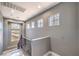 Bright stairway features modern railing, window views, and recessed lighting at 3552 Coventry Gardens Dr, Las Vegas, NV 89135