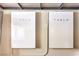 Two Tesla Powerwall units are mounted on the wall at 3552 Coventry Gardens Dr, Las Vegas, NV 89135
