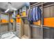 Spacious walk-in closet featuring custom shelving, drawers, and ample hanging space for an organized wardrobe at 3552 Coventry Gardens Dr, Las Vegas, NV 89135