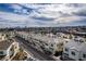 Attractive townhome community with well-maintained streets and manicured landscaping and garages at 3585 Arcadian Sea St, Las Vegas, NV 89106