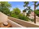 The balcony offers a beautiful view of lush trees and greenery and is perfect for relaxation at 3740 Desert Marina Dr # 2, Laughlin, NV 89029