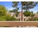 The balcony offers serene views of the community's lush greenery and adjacent buildings at 3740 Desert Marina Dr # 2, Laughlin, NV 89029