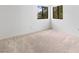 Bright bedroom with neutral carpet and windows at 3740 Desert Marina Dr # 2, Laughlin, NV 89029