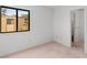 Bedroom with window view and bathroom entrance at 3740 Desert Marina Dr # 2, Laughlin, NV 89029