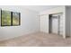 Bedroom with closet, neutral carpet, and natural light at 3740 Desert Marina Dr # 2, Laughlin, NV 89029