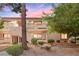 Inviting two-story condo featuring private balconies and mature landscaping at sunset at 3740 Desert Marina Dr # 2, Laughlin, NV 89029
