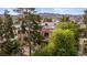 Condominium complex with private balconies, a red tile roof, and mature landscaping at 3740 Desert Marina Dr # 2, Laughlin, NV 89029