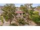 Charming condominium complex with private entrances, red tile roofing, and mature trees at 3740 Desert Marina Dr # 2, Laughlin, NV 89029
