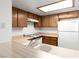 Efficient kitchen design with durable counters, wooden cabinets, and a bright, functional space at 3740 Desert Marina Dr # 2, Laughlin, NV 89029