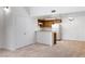 Inviting open-concept living area featuring breakfast bar and kitchen appliances at 3740 Desert Marina Dr # 2, Laughlin, NV 89029