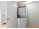 Laundry room including stacked washer and dryer at 3740 Desert Marina Dr # 2, Laughlin, NV 89029