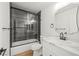 Stylish bathroom showcasing a tiled shower with a glass door and modern vanity at 389 Umbria Way, Henderson, NV 89014