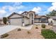 Charming single-Gathering home with a two-car garage and desert landscaping for low maintenance at 389 Umbria Way, Henderson, NV 89014