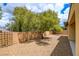 Low maintenance backyard featuring desert landscaping and privacy wall at 4 Chatmoss Rd, Henderson, NV 89052