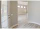 Open-concept entryway showcases the hardwood floors and open floorplan at 4 Chatmoss Rd, Henderson, NV 89052