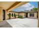 Exterior with desert landscaping and covered porch at 4 Chatmoss Rd, Henderson, NV 89052