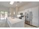 The gourmet kitchen features a large center island, modern appliances, and lots of cabinet space at 4 Chatmoss Rd, Henderson, NV 89052