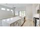 The gourmet kitchen features a large center island, modern appliances, and lots of cabinet space at 4 Chatmoss Rd, Henderson, NV 89052