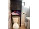 Bathroom with vanity and cabinet for additional storage at 400 National St, Henderson, NV 89015