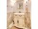 Bathroom vanity with modern sink, tile flooring, and decorative mirror at 4211 Bradley Rd, Las Vegas, NV 89130