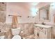 Bathroom featuring custom vanity with a stylish sink and a decorative mirror at 4211 Bradley Rd, Las Vegas, NV 89130