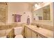Full bathroom featuring tile walls, tile counter, and sink at 4211 Bradley Rd, Las Vegas, NV 89130