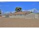 A single-story home with a carport and desert-friendly landscaping, including a block wall for privacy at 4211 Bradley Rd, Las Vegas, NV 89130