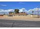 Charming single-story home with a low brick wall and desert-friendly landscaping at 4211 Bradley Rd, Las Vegas, NV 89130