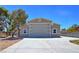 A well-built, detached garage with a wide door and clean concrete driveway at 4211 Bradley Rd, Las Vegas, NV 89130