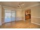 Light-filled living room with hardwood floors and direct access to outdoor patio at 4211 Bradley Rd, Las Vegas, NV 89130