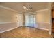 Bright room with hardwood floors, patio access, and entry door at 4211 Bradley Rd, Las Vegas, NV 89130