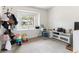 Bedroom featuring toys, a window, and a view to the outdoors at 4620 Pacer Ave, North Las Vegas, NV 89031
