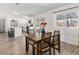 Dining area with a wood table that has seating for four at 4620 Pacer Ave, North Las Vegas, NV 89031