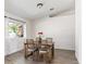 Dining area with a wood table that has seating for four at 4620 Pacer Ave, North Las Vegas, NV 89031