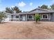 Charming single-story home with gravel landscaping and a light gray exterior paint at 4620 Pacer Ave, North Las Vegas, NV 89031