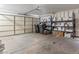 Functional garage featuring a white door, providing secure parking and additional storage space at 4620 Pacer Ave, North Las Vegas, NV 89031