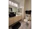 Functional bathroom with vanity, toilet, and ample storage space at 4662 Kelly Barry Way, Las Vegas, NV 89121