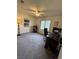 Spacious bedroom with large windows, plush carpeting, and ample natural light at 4662 Kelly Barry Way, Las Vegas, NV 89121